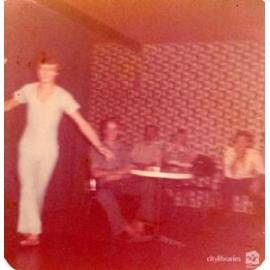 Staff around table, Carramar Children's Home, Townsville, ca. 1974