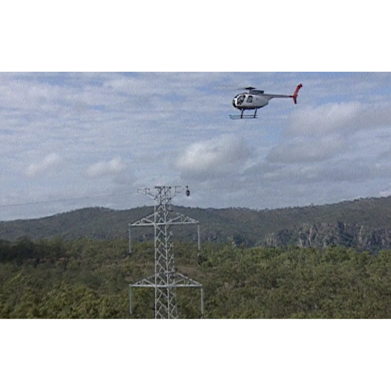 Stock footage: helicopter stringing