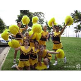 Performing group posing after the Tropigo Carnival parade at Cultural Fest, The Strand, Townsville, 18 August 2007