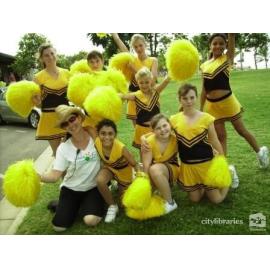 Performing group posing with staff member after the Tropigo Carnival parade at Cultural Fest, The Strand, Townsville, 18 August 2007