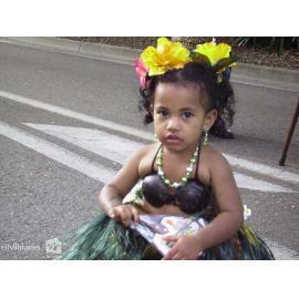 Young performer from Townsville Cook Islands Dance Group in the Tropigo Carnival parade at Cultural Fest, The Strand, Townsville, 18 August 2007