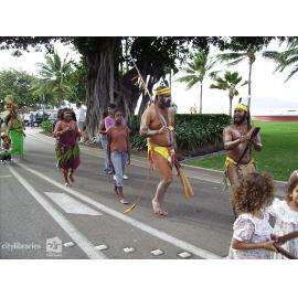 Members of Gulumba Dance Group and Nyarku Undanu and Julbu Julbu Dancers in the Tropigo Carnival parade at Cultural Fest, the Strand, Townsville, 18 August 2007