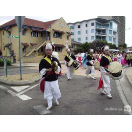 Performers from Suwon City Korea in the Tropigo Carnival parade at Cultural Fest, The Strand, Townsville, 18 August 2007