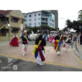 Performers from Suwon City Korea in the Tropigo Carnival parade at Cultural Fest, The Strand, Townsville, 18 August 2007
