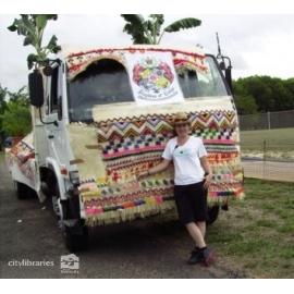Staff member in front of the Townsville Tongan Group float in the Tropigo Carnival parade at Cultural Fest, The Strand, Townsville, 18 August 2007
