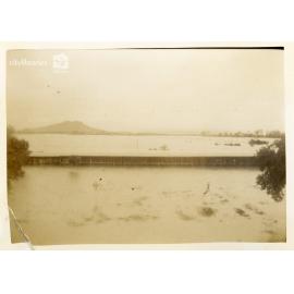 Stables at the back of the grandstand, Cluden Racecourse, during flood, Townsville [10 February 1946]