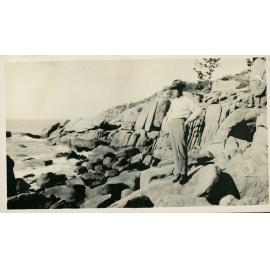 Arthur (Doug) Armstrong on the rocks at Alma Bay, Magnetic Island, [between 1908 and 1930].