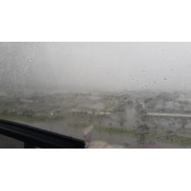 Ingham Road over RAAF Base to Airport, aerial footage during floods, 2019. 