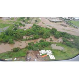Stuart Creek in flood, aerial photograph, 2019. 