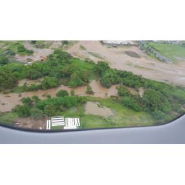 Stuart Creek in flood, aerial photograph, 2019. 