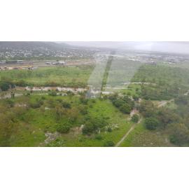 Stuart Creek in flood, aerial photograph, 2019. 