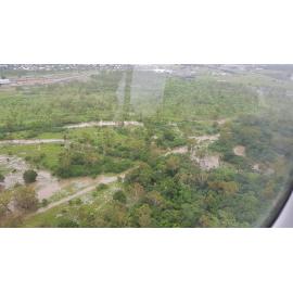 Stuart Creek in flood, aerial photograph, 2019. 