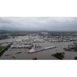 Stuart Drive Intersection, Kmart Fairfield, Townsville Turf Club, aerial photograph during floods, 2019. 