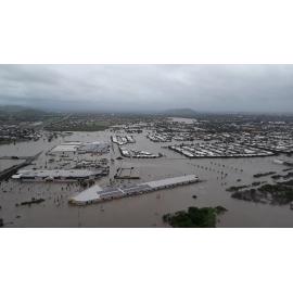 Stuart Drive Intersection, Kmart Fairfield, Townsville Turf Club, aerial photograph during floods, 2019. 