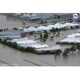 Woolworths Fairfield Central, and inundated streets, aerial photograph during floods, 2019.