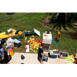 Hermit Park AFL Club volunteers removing flood damaged appliances, Hermit Park, 2019