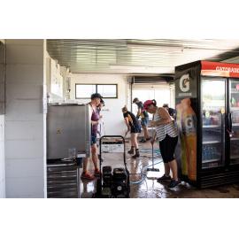 Hermit Park AFL Club volunteers cleaning out kitchen, Hermit Park, 2019