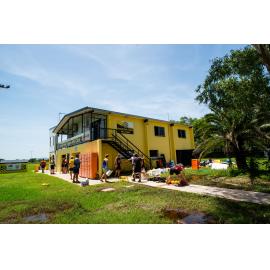 Hermit Park AFL Club volunteers outside clubhouse, Hermit Park, 2019