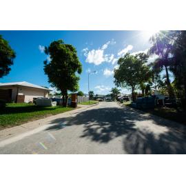 Damaged household goods lining streets of flood affected street, Idalia, 2019