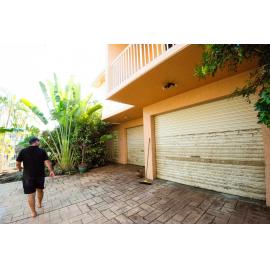 Flood high water mark against garage doors, Rosslea, 2019. 