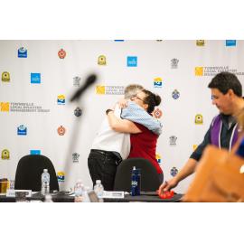 Local Disaster Coordinator Wayne Preedy and member embrace, Disaster Committee Meeting, 2019.