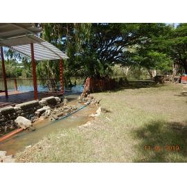Erosion of riverbank around Gleesons Weir Lookout cause by flood waters, 2019.