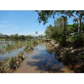 Submerged and debris covered Riverway boardwalk, 2019. 