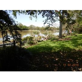 Submerged and debris covered Riverway boardwalk, 2019. 