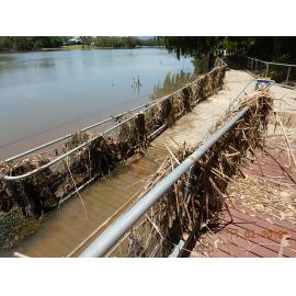 Submerged and debris covered Riverway boardwalk, 2019. 