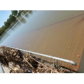 Submerged and debris covered Riverway boardwalk, 2019. 