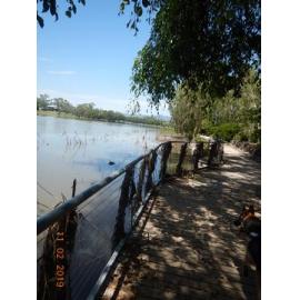 Submerged and debris covered Riverway boardwalk, 2019. 