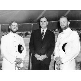 His Worship the Mayor, Alderman Angus J. Smith, O.B.E. speaks with officers from a visiting R.A.N. Frigate, after the official opening of Jezzine Barracks, Townsville, Saturday 31st October, 1964. 