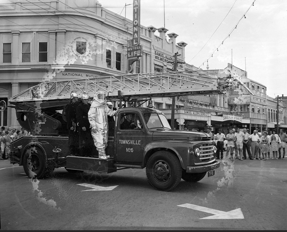 Fire engine in the Centenary Parade, corner of Flinders and Denham Street, Townsville, November 1964